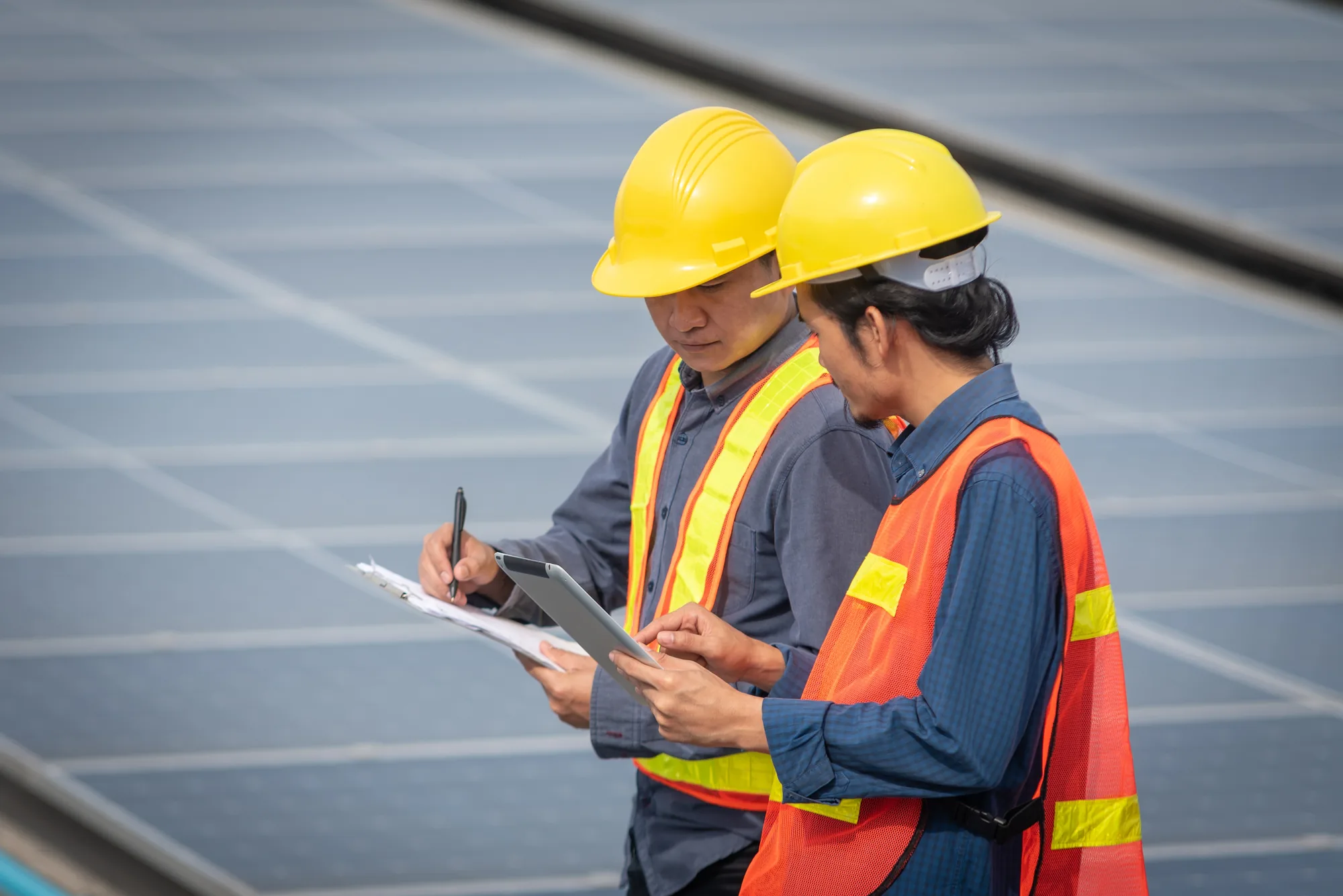 Engineers reviewing project documentation